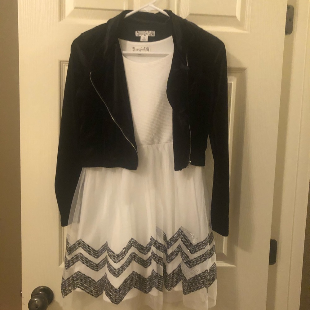 Super cute creme dress with black jacket
